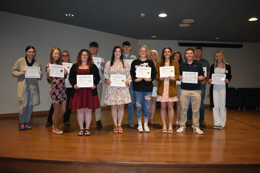 Scholarship Foundation Awards recipients pose on stage