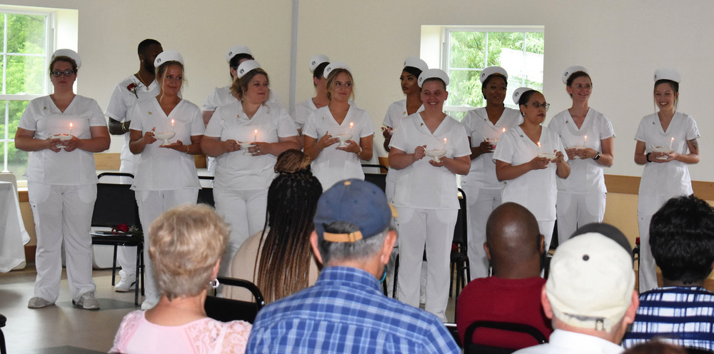 Herkimer BOCES full-time LPN graduates during a candle-lighting ceremony