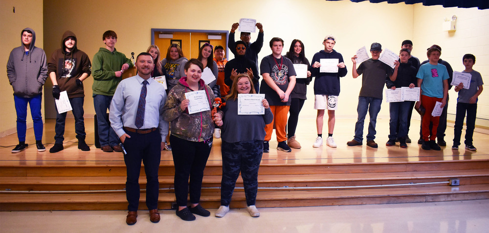 Pathways Academy students posing with award certificates