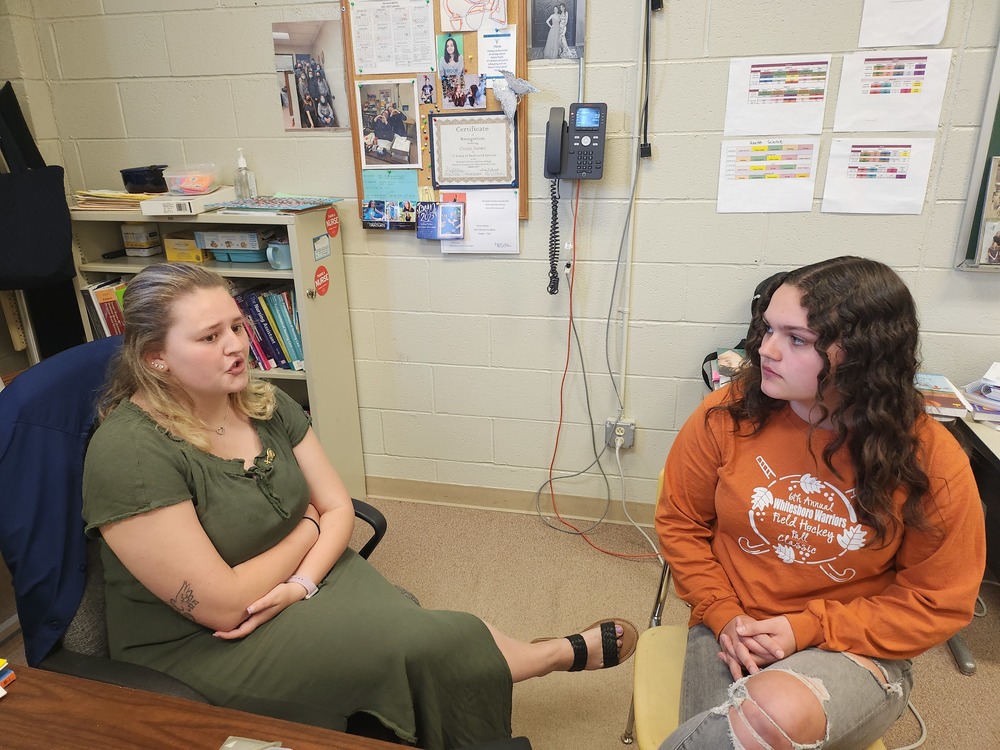 Health Science Careers graduate meets with senior student in May 2023