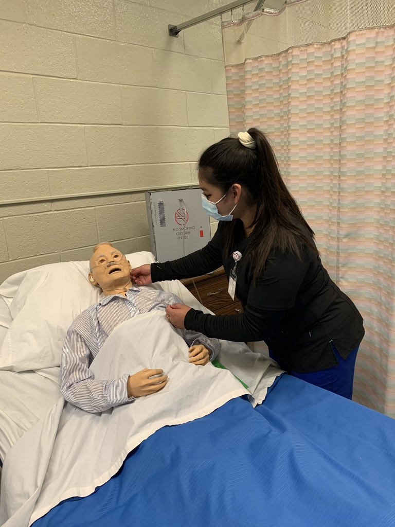 Health Science Careers student with a mannequin