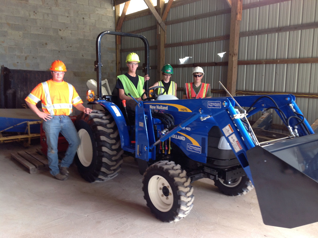Heavy Equipment students with a vehicle