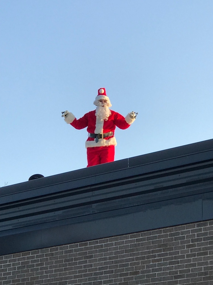 Santa on the roof close