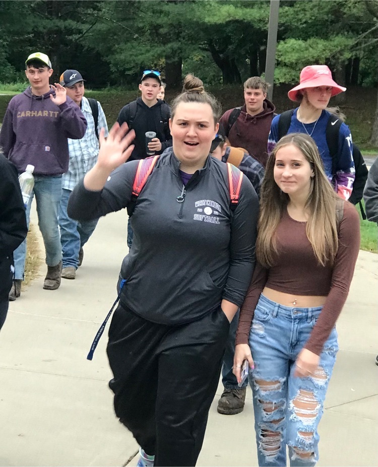 students waving hello
