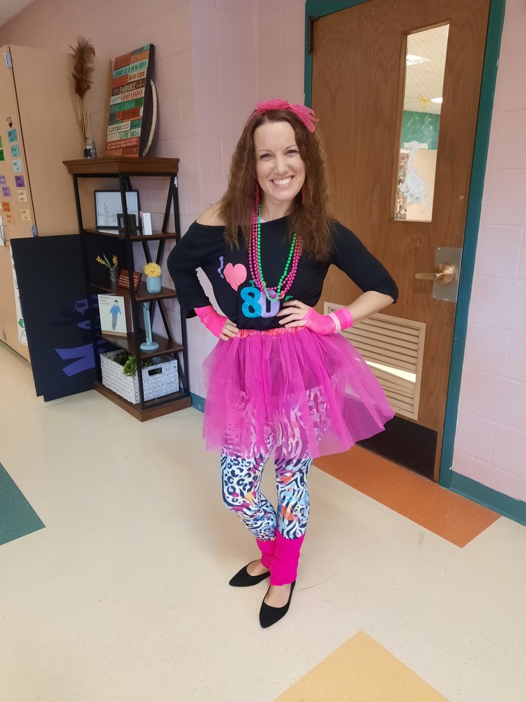 A Pathways Academy staff member in 80s gear for Halloween