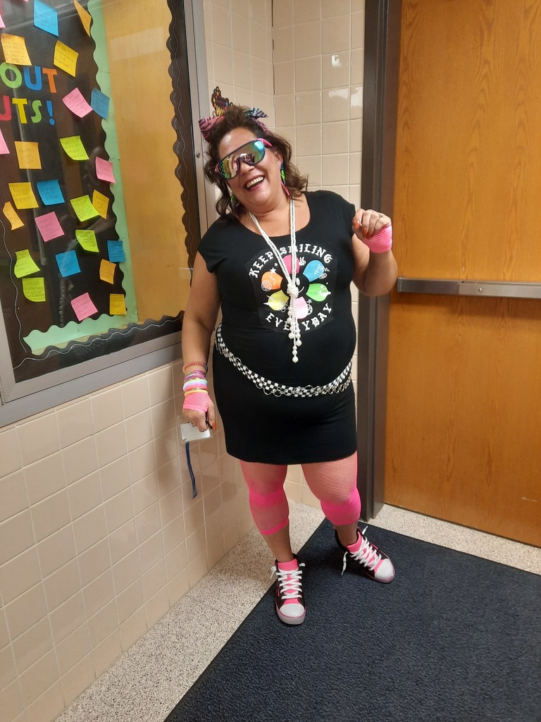 A Pathways Academy staff member in 80s gear for Halloween