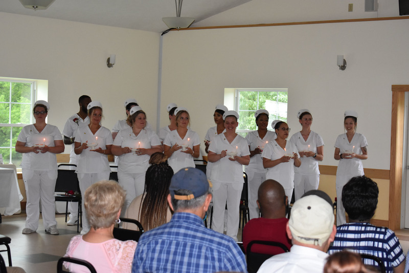 Herkimer BOCES full-time LPN graduates during a candle-lighting ceremony
