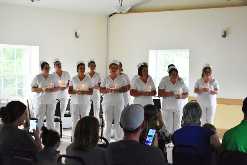 Herkimer BOCES part-time day LPN graduates during a candle-lighting ceremony
