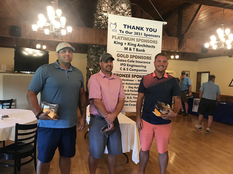 Golf tournament winners pose for a photo