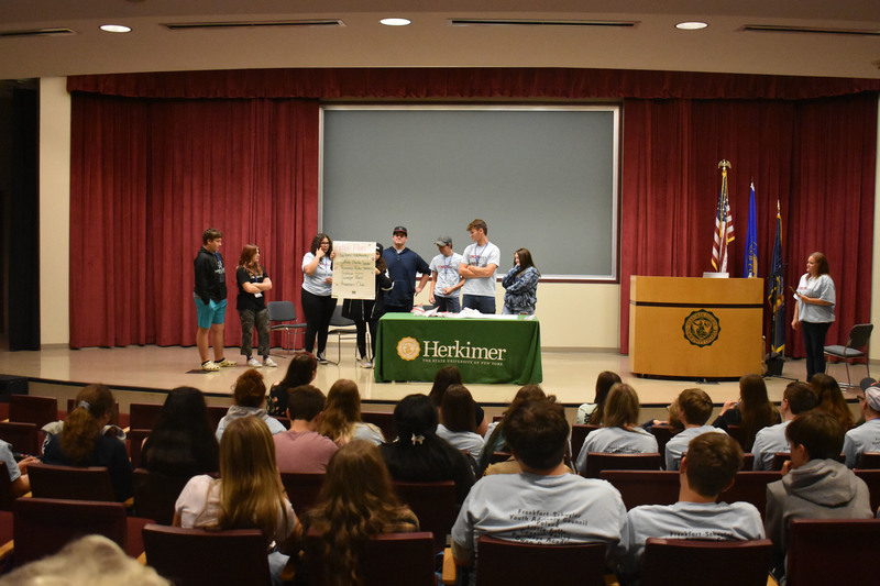 VP-TECH students presenting on stage at the Youth Summit at Herkimer College