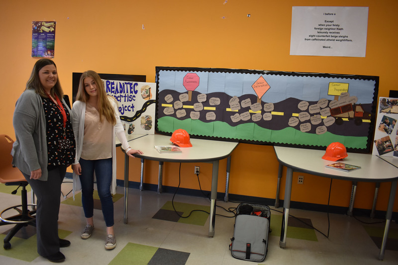 Herkimer BOCES READiTEC exhibit with one staff member and one student