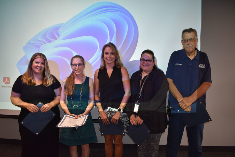 Five staff members with 10 years of service