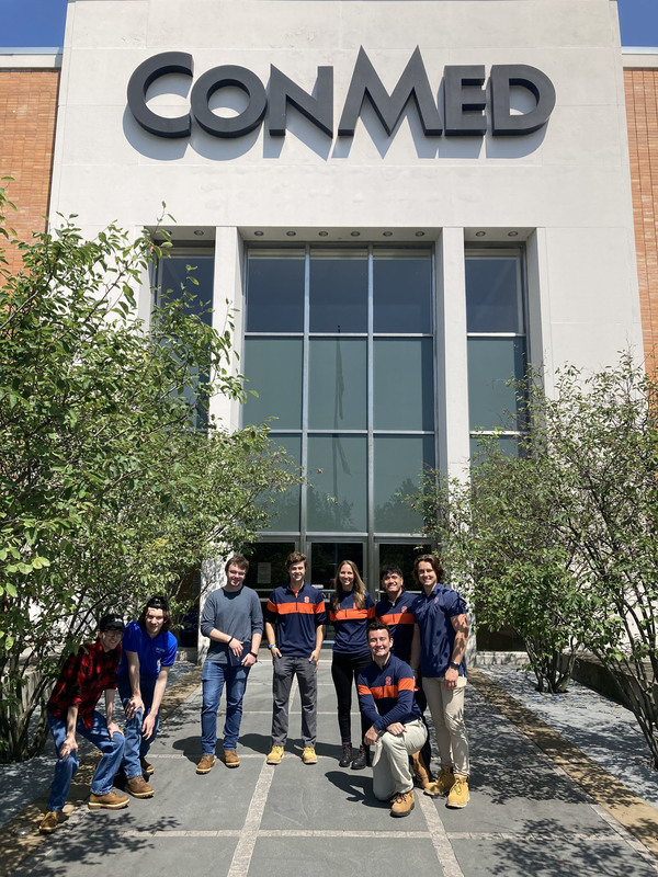 Three VP-TECH interns with Syracuse University graduates in front of ConMed